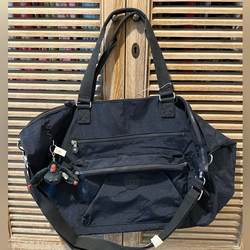 NWTs: large Kipling travel bag with sleeve for luggage handle